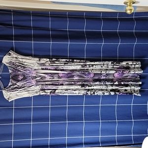 Fun designed dress, purple black and white in color. Size L by Apt 9